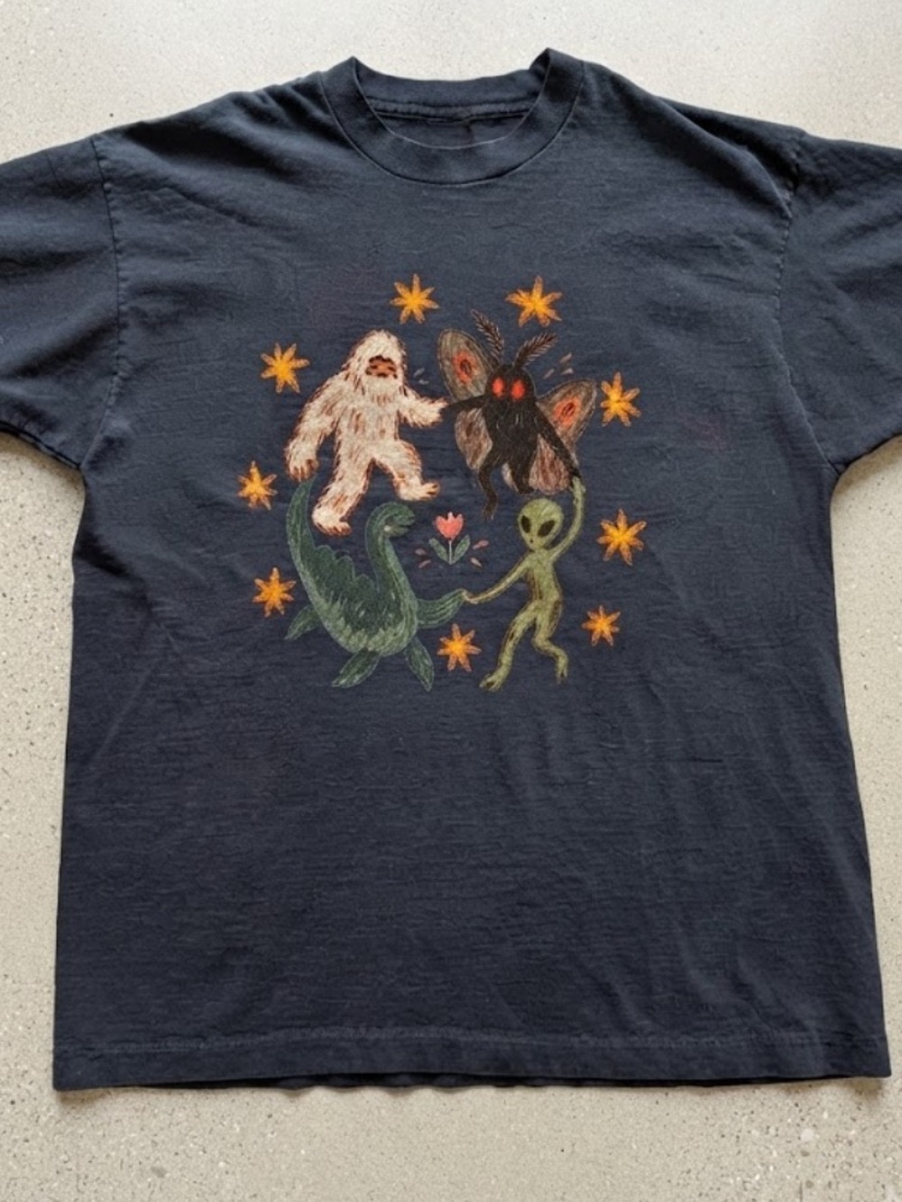 Bigfoot Mothman Loch Ness Monster Alien Cryptids Stars Vintage Black T-Shirt